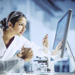 Woman looking at a computer