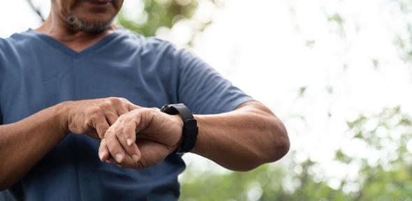 Man looking at his watch